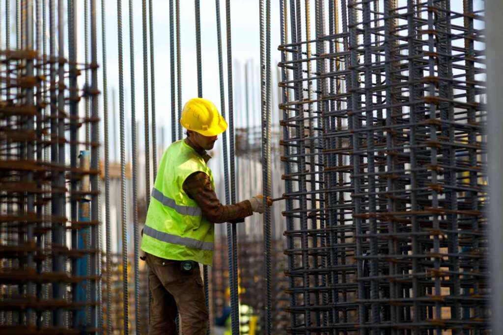 Man Working hard at residential construction site